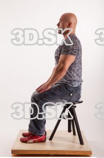 Sitting reference jeans tshirt of Sebastian 0001
